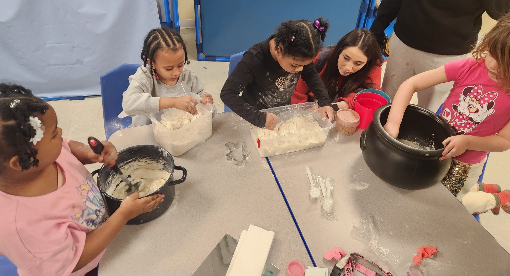 Students doing hands-on sensory play